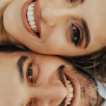 a man and woman taking a selfie